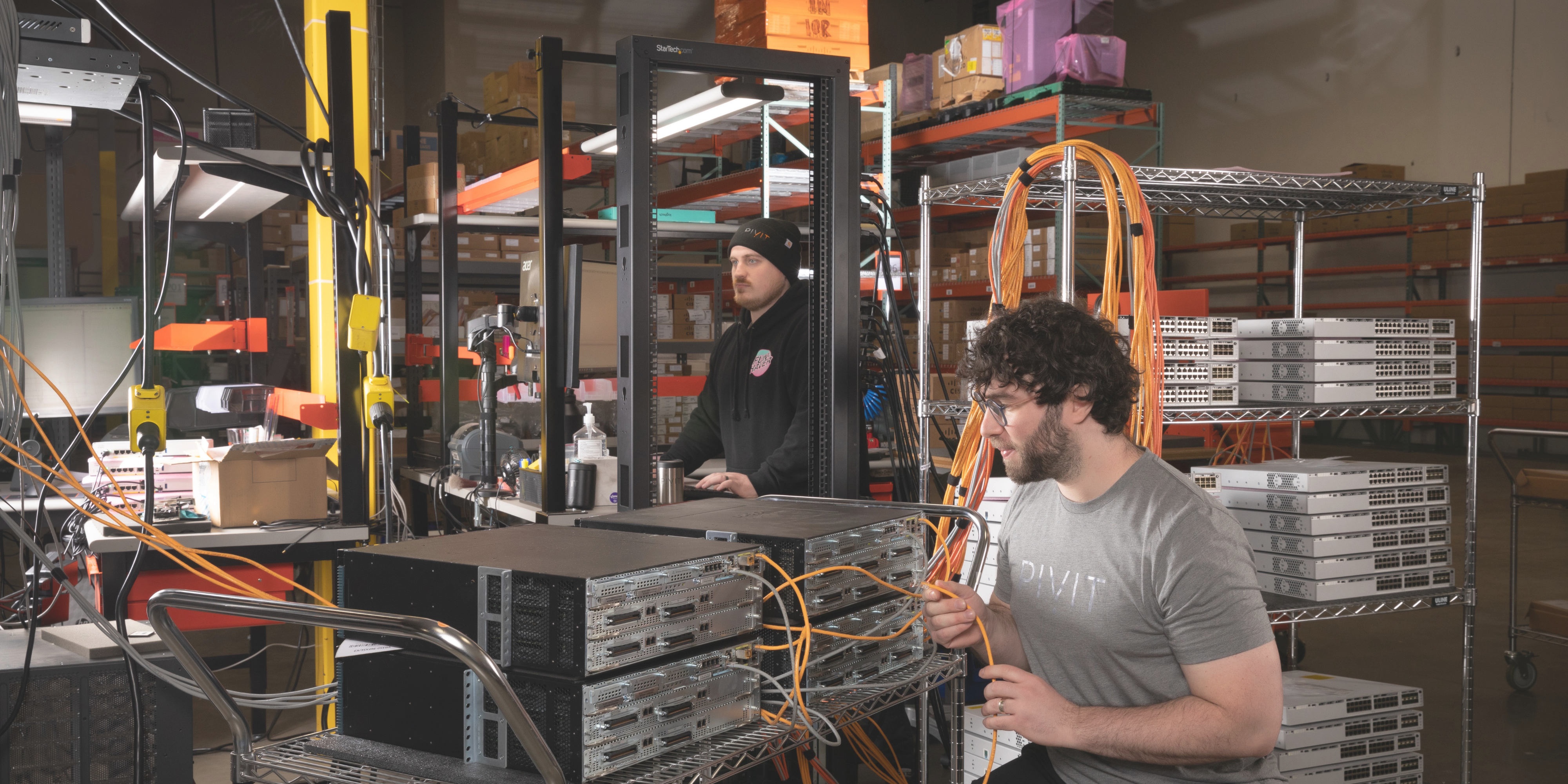 pivit technician working on server rack